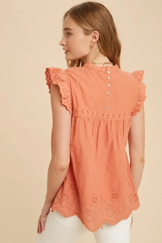Women's Mock Neck Ruffled Sleeveless Floral Eyelet Blouse in Burnt Coral
